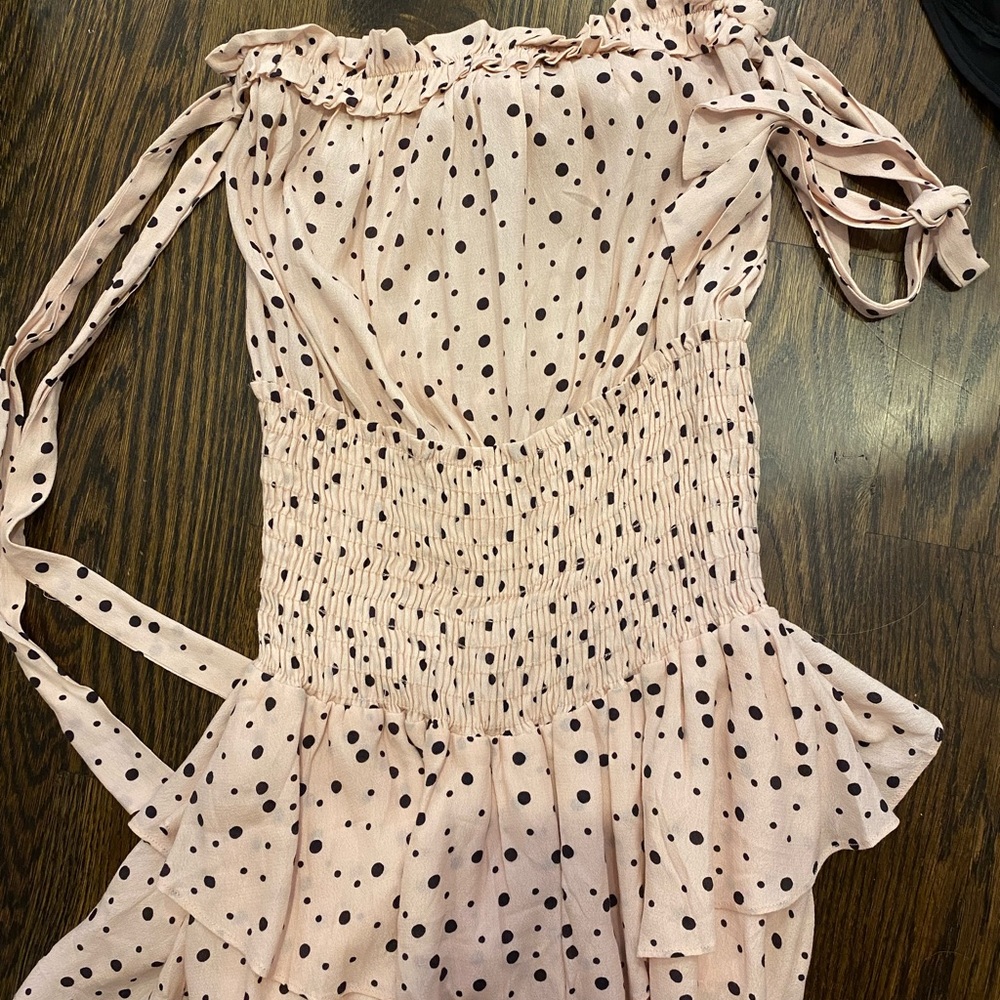 Light pink and black polka dot romper